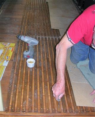 Screwing the walking slats to the Coach floor