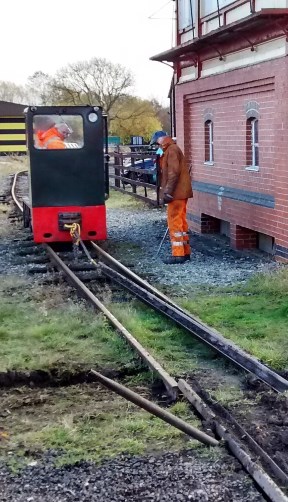 Image:- Dragging rails away from Level Crossing, with loco AD34