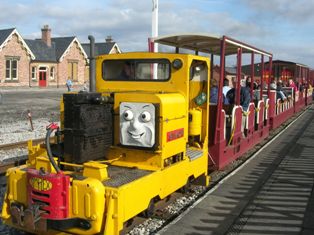 image:- Campbells hauling a passenger train at the March Thomas 
            Event leaving Butterley Park Station